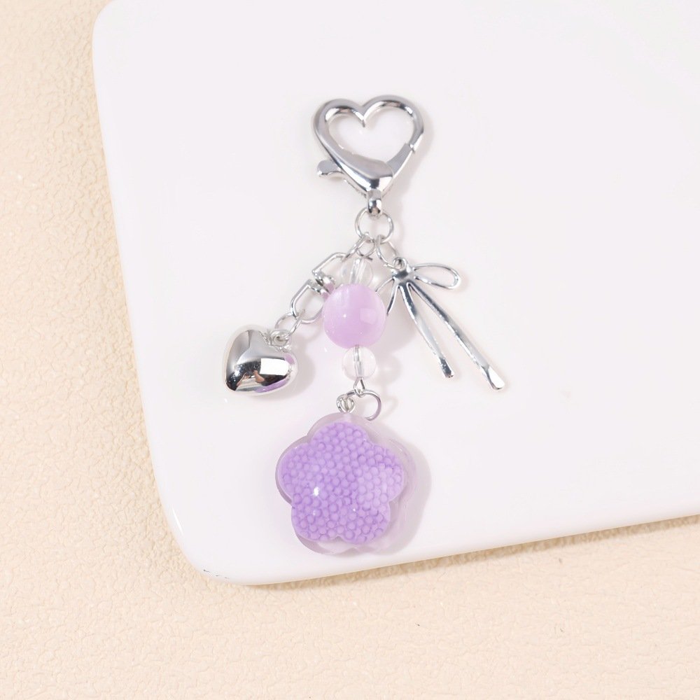 ins resin plum blossom metal bow pearl keychain diy phone bag accessory headphone case hanging charm ins resin plum blossom metal bow pearl keychain diy phone bag accessory headphone case hanging charm