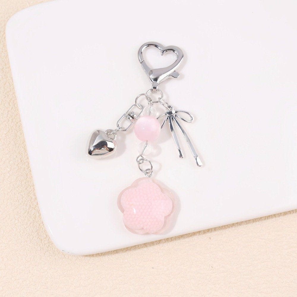 ins resin plum blossom metal bow pearl keychain diy phone bag accessory headphone case hanging charm ins resin plum blossom metal bow pearl keychain diy phone bag accessory headphone case hanging charm