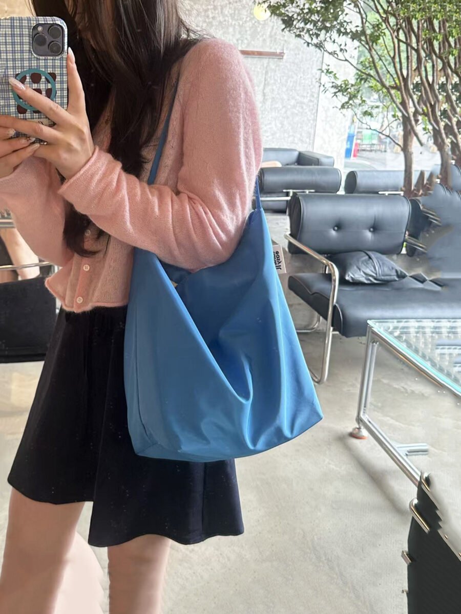 korean niche red nylon tote bag for women, casual lightweight canvas bag, relaxed and large capacity single shoulder bucket bag korean niche red nylon tote bag for women, casual lightweight canvas bag, relaxed and large capacity single shoulder bucket bag