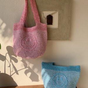 amazon cross border hand crocheted bohemian style bag, european and american hand crocheted, cute smiley face knitted mini handbag