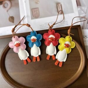 hand sewn cute animal bag with imported leather, keychain ornament, little yellow duck pendant, adorable flower duck