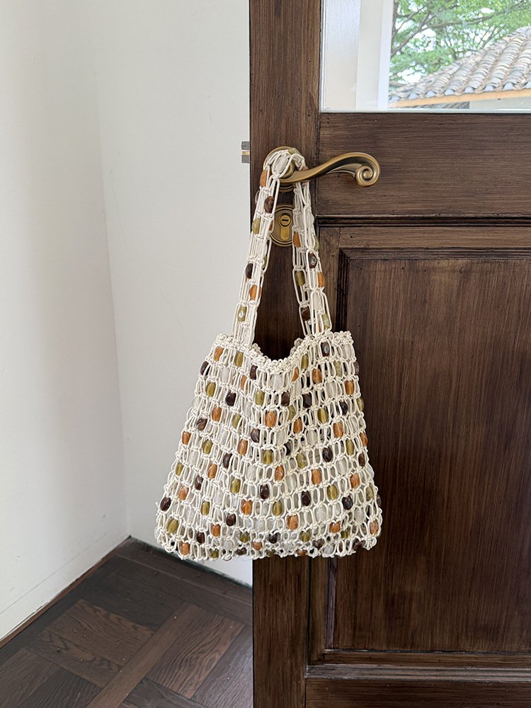 handmade woven beaded bags, color block designs, fashionable and high end shopping bags, mesh pockets, totes, beach vacation bags handmade woven beaded bags, color block designs, fashionable and high end shopping bags, mesh pockets, totes, beach vacation bags