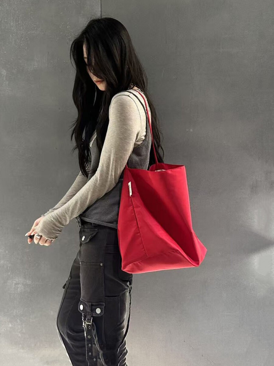 korean niche red nylon tote bag for women, casual lightweight canvas bag, relaxed and large capacity single shoulder bucket bag korean niche red nylon tote bag for women, casual lightweight canvas bag, relaxed and large capacity single shoulder bucket bag
