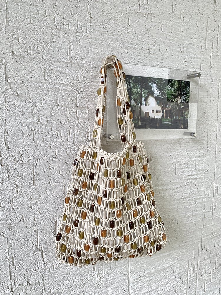 handmade woven beaded bags, color block designs, fashionable and high end shopping bags, mesh pockets, totes, beach vacation bags handmade woven beaded bags, color block designs, fashionable and high end shopping bags, mesh pockets, totes, beach vacation bags