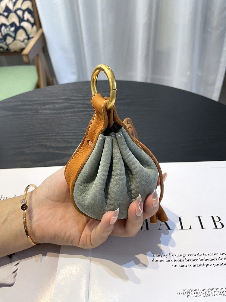 genuine leather coin key bag, top layer cowhide lipstick, earphone storage bag, new drawstring mini bag, small charm bag for women genuine leather coin key bag, top layer cowhide lipstick, earphone storage bag, new drawstring mini bag, small charm bag for women